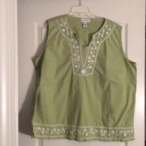 Women green top with white embroidery